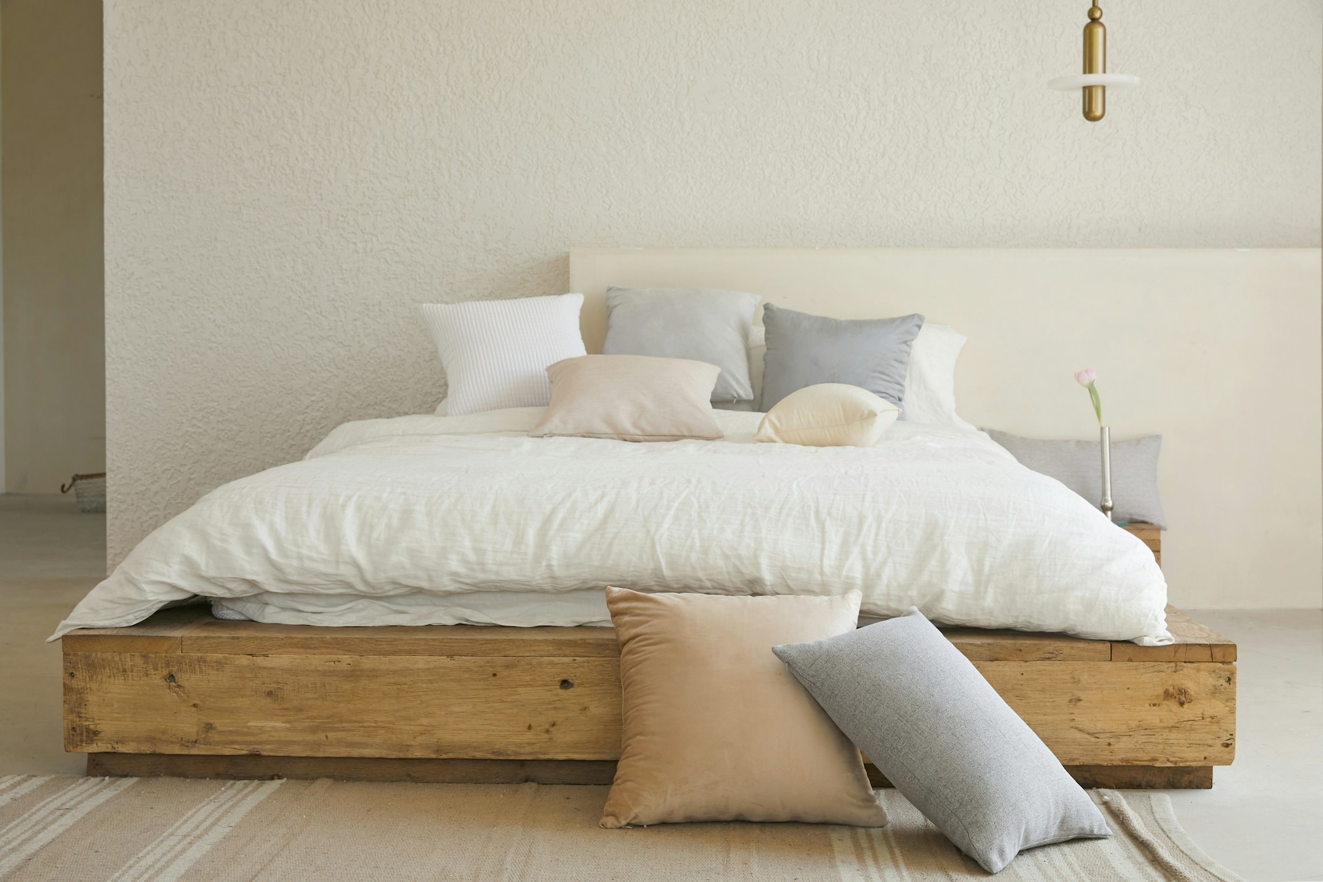 The Power of Nice, Neat Bedding: Transforming an Unmade Bed into a Cozy Haven